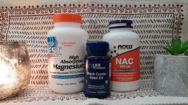 Some of my essential supplements: Magnesium, Black Seed Oil, and NAC